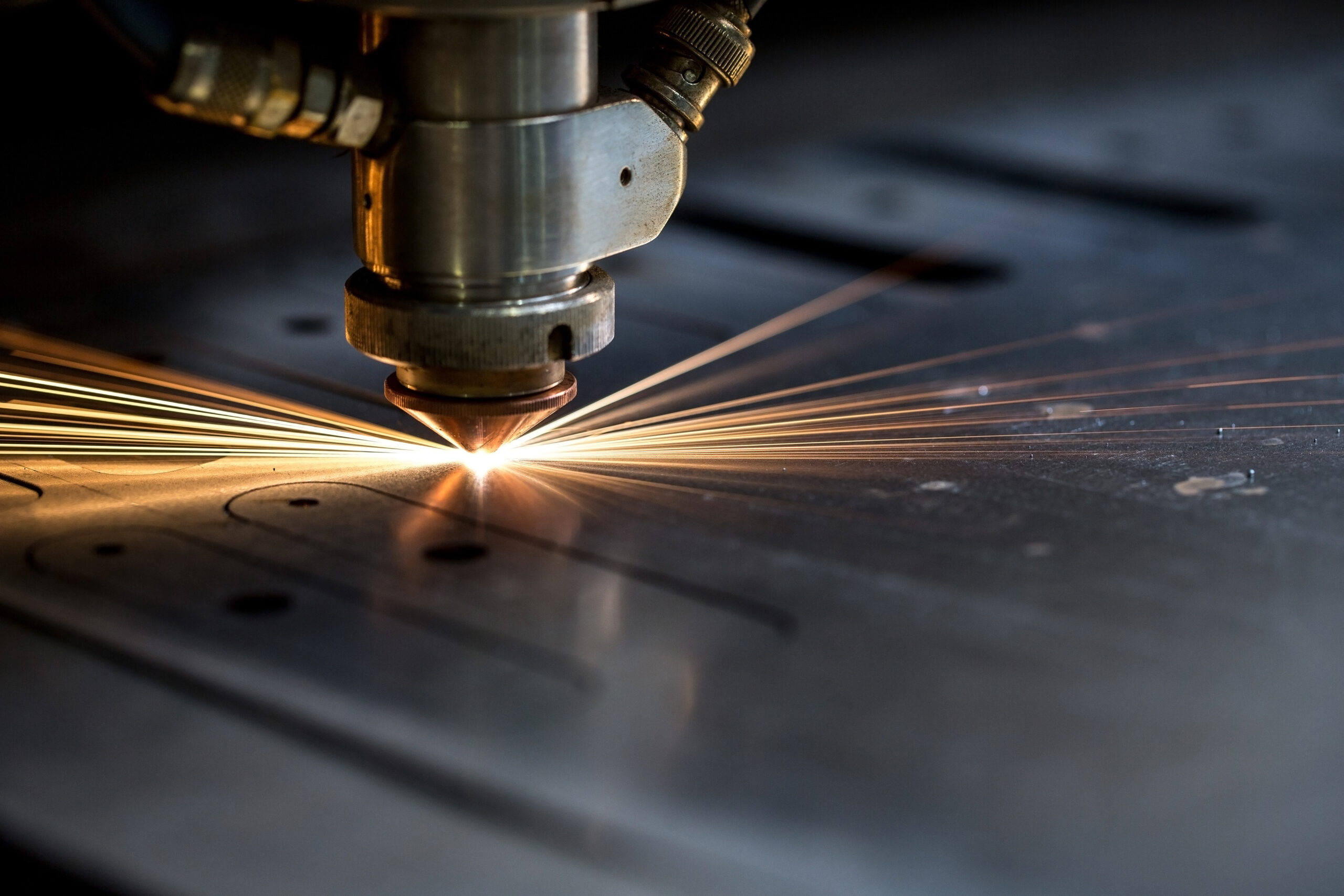 Cutting,Of,Metal.,Sparks,Fly,From,Laser